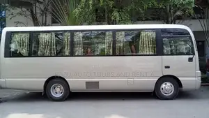 Nissan Coster Bus For Rent