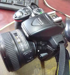 ডিএসএলআর ক্যামেরা + লেন্স