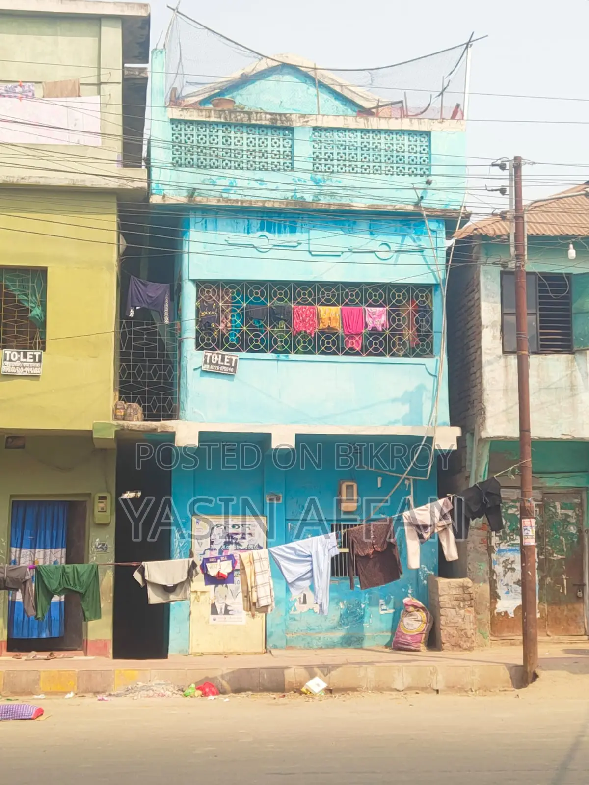 Three-story building for sale at an affordable price