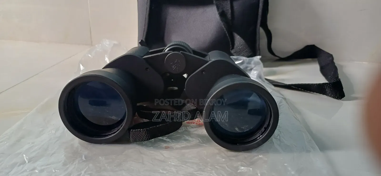 Binocular: Bushnell 10-70*70