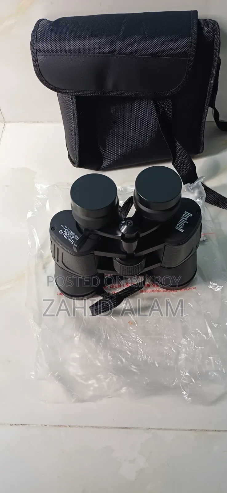 Binocular: Bushnell 10-70*70