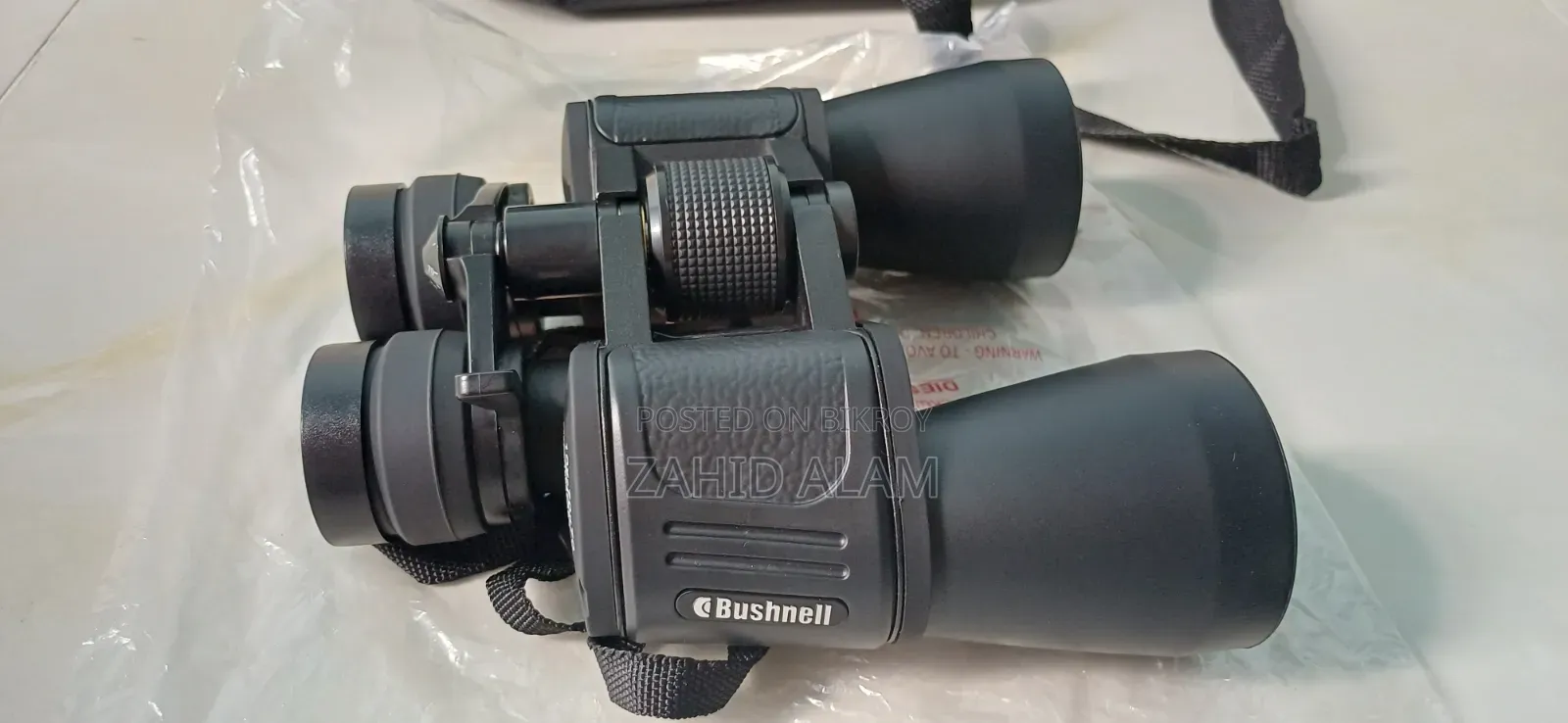 Binocular: Bushnell 10-70*70