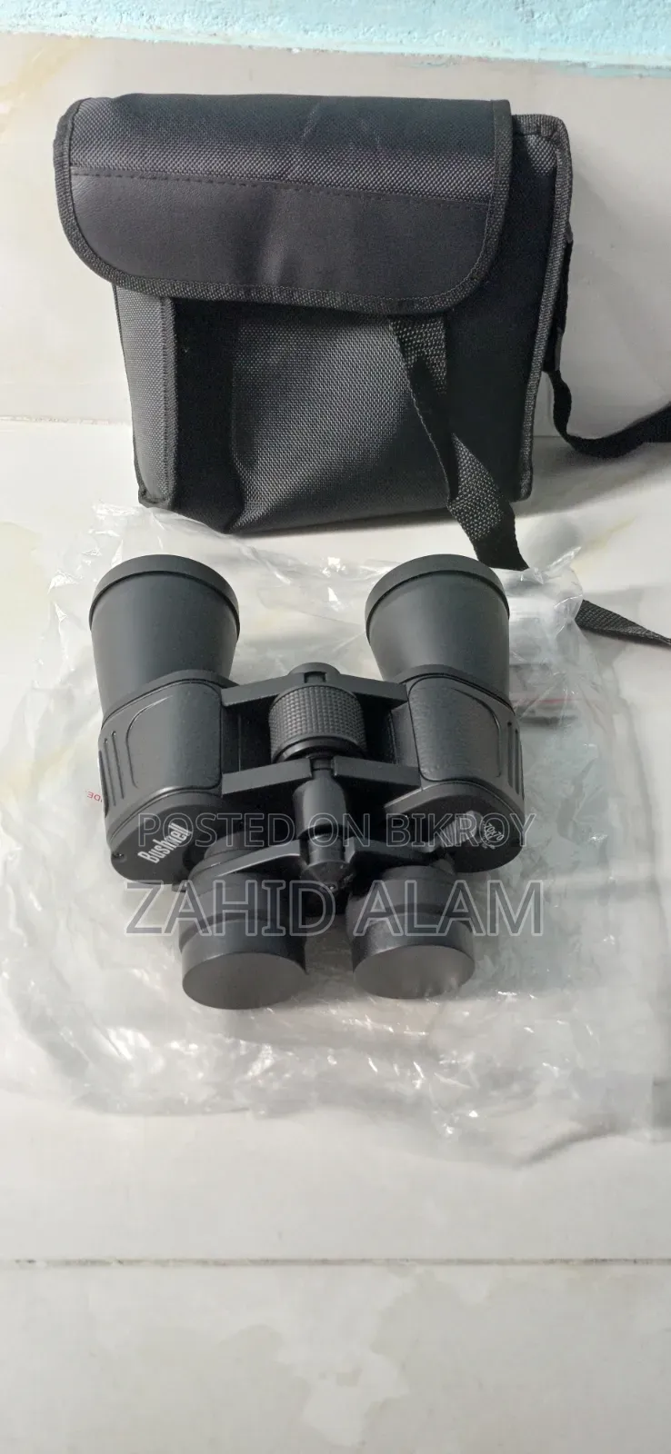 Binocular: Bushnell 10-70*70