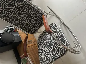 রিবোলভিং চেয়ার , কালো কাপড় ,স্টিলের হাতল , এবং পা ও স্টিলের