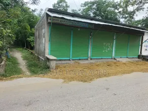 Land for Sale with Three Running Shops