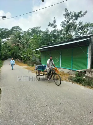 Land for Sale with Three Running Shops