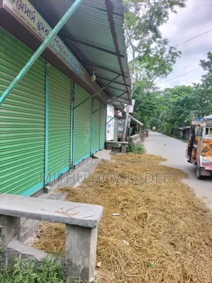 Land for Sale with Three Running Shops