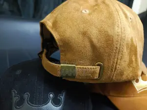 Brown Leather Cap by Mahfuz