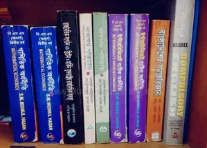 Economics 1st, 2nd, and 3rd-year books for sale.