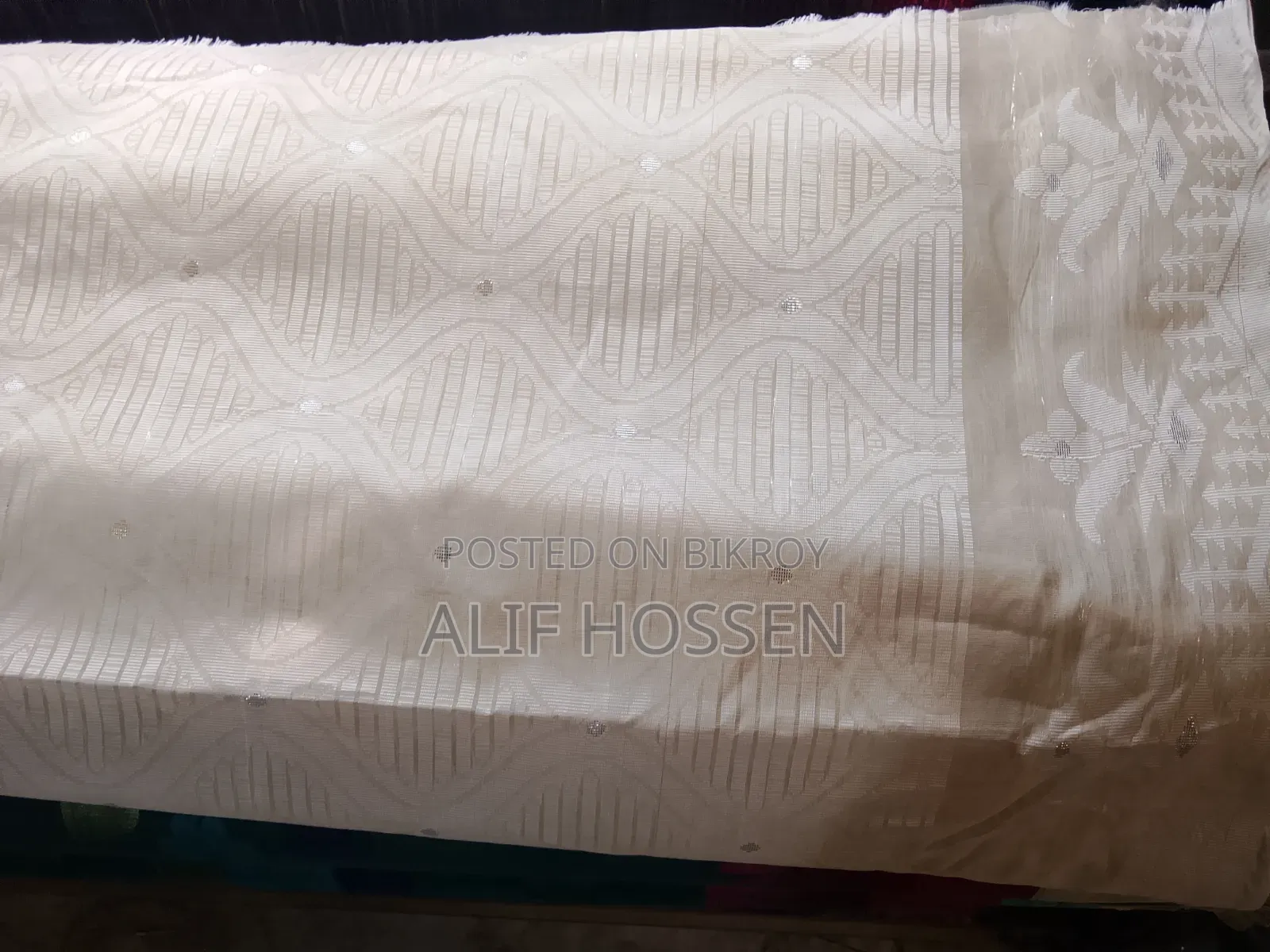 Experience Elegance with This Half Silk Tat Saree