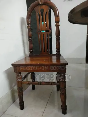 Dining table and three chairs for sale.