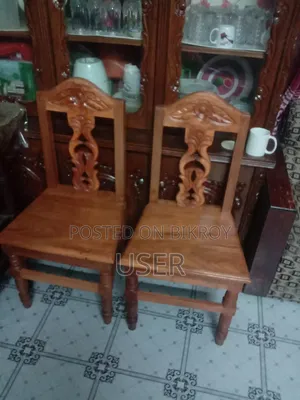 Dining table made of local Neem and Siris wood with 4 chairs