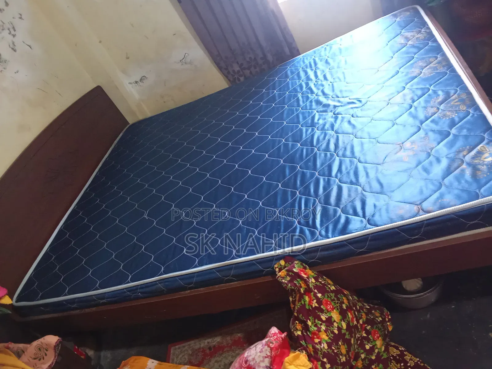 A Bed and a Dressing Table