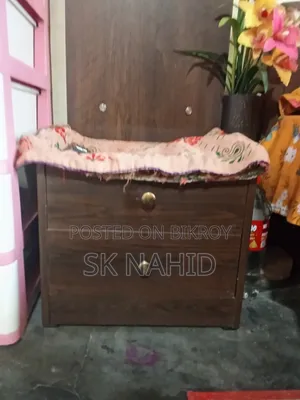 A Bed and a Dressing Table