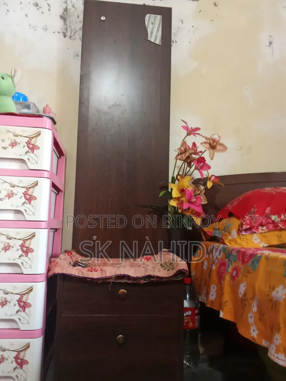 A Bed and a Dressing Table