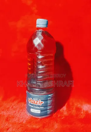 ১০০% খাঁটি দেশি সরিষার তেল।