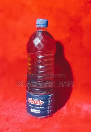 ১০০% খাঁটি দেশি সরিষার তেল।