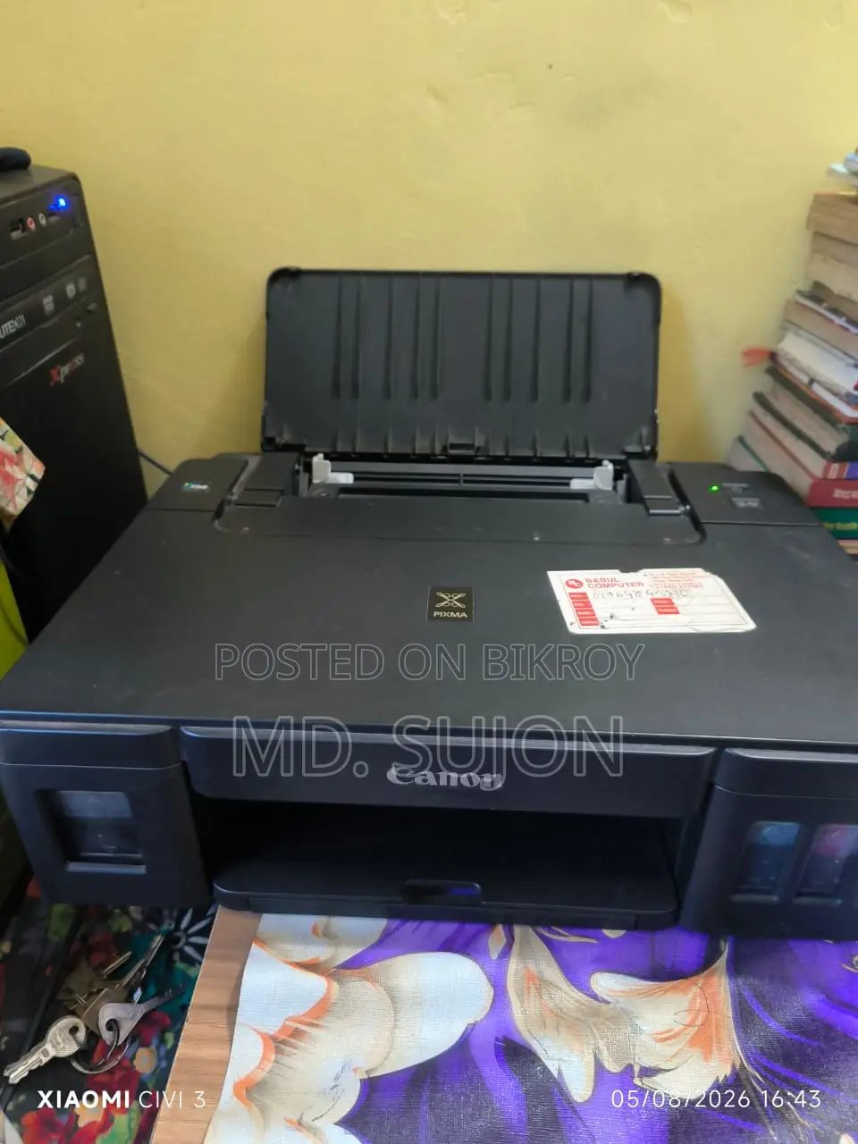 ক্যানন জি১০০০