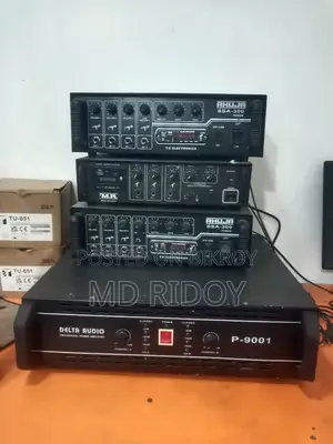 Sound System: Two Large Boxes, Three Small Boxes, Four Mics, and One Mixer