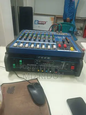 সাউন্ড বক্স বড় বক্স দুইটা ছোট বক্স তিনটা ও চারটা মাইক একটি মিকচার