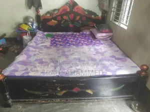 One Bed and One Wardrobe