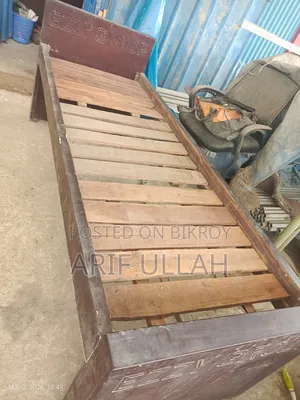 Wooden Single Bed. Length 7' Wide 2.5'