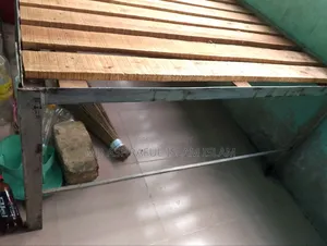 A small steel bed for sale