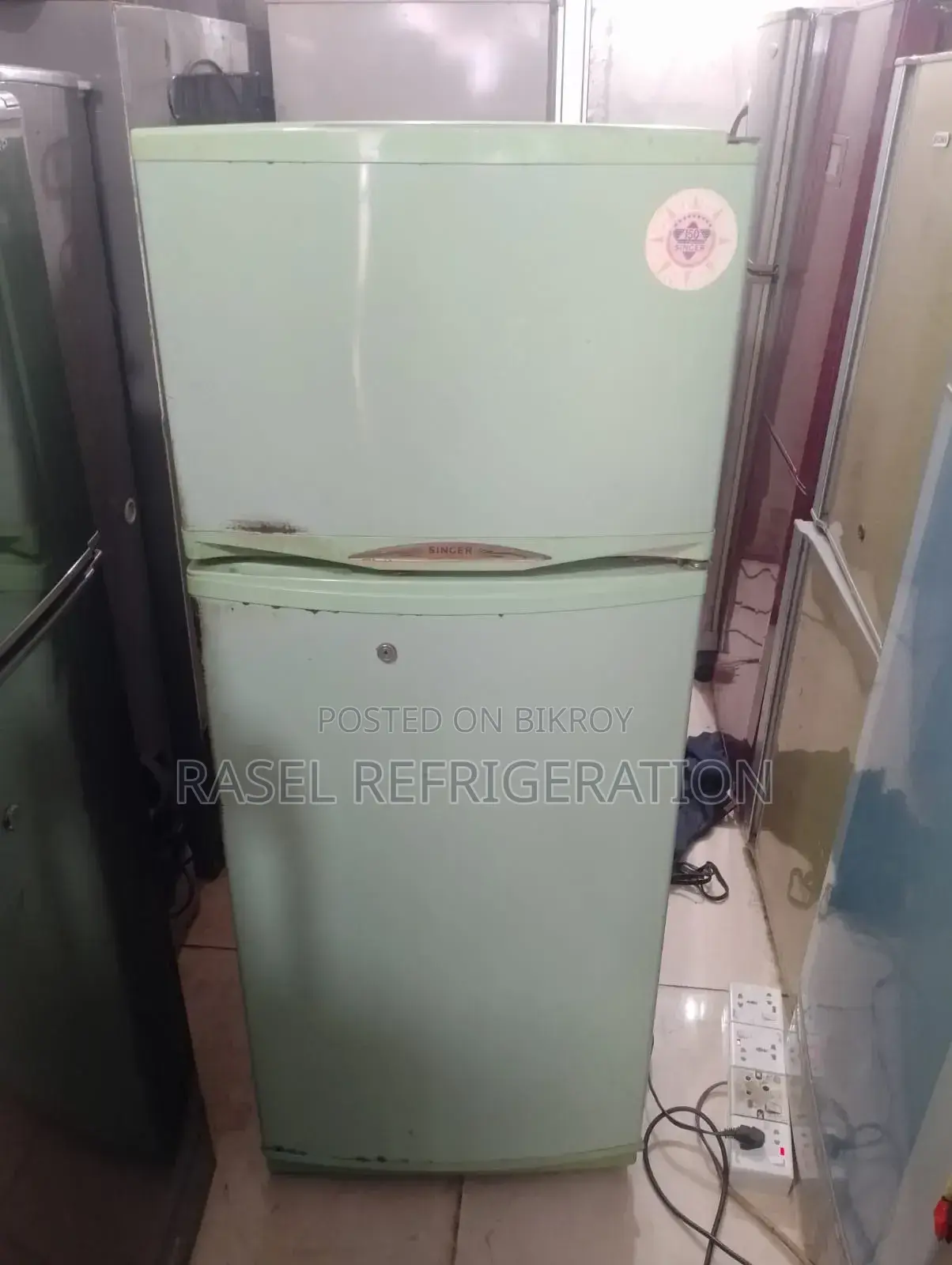 14 Cft running Singer fridge. 15-day replacement warranty.
