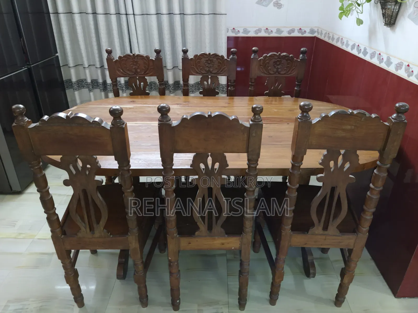 6-seater Teak Wood Dining Table. Comes with a free table cover set.