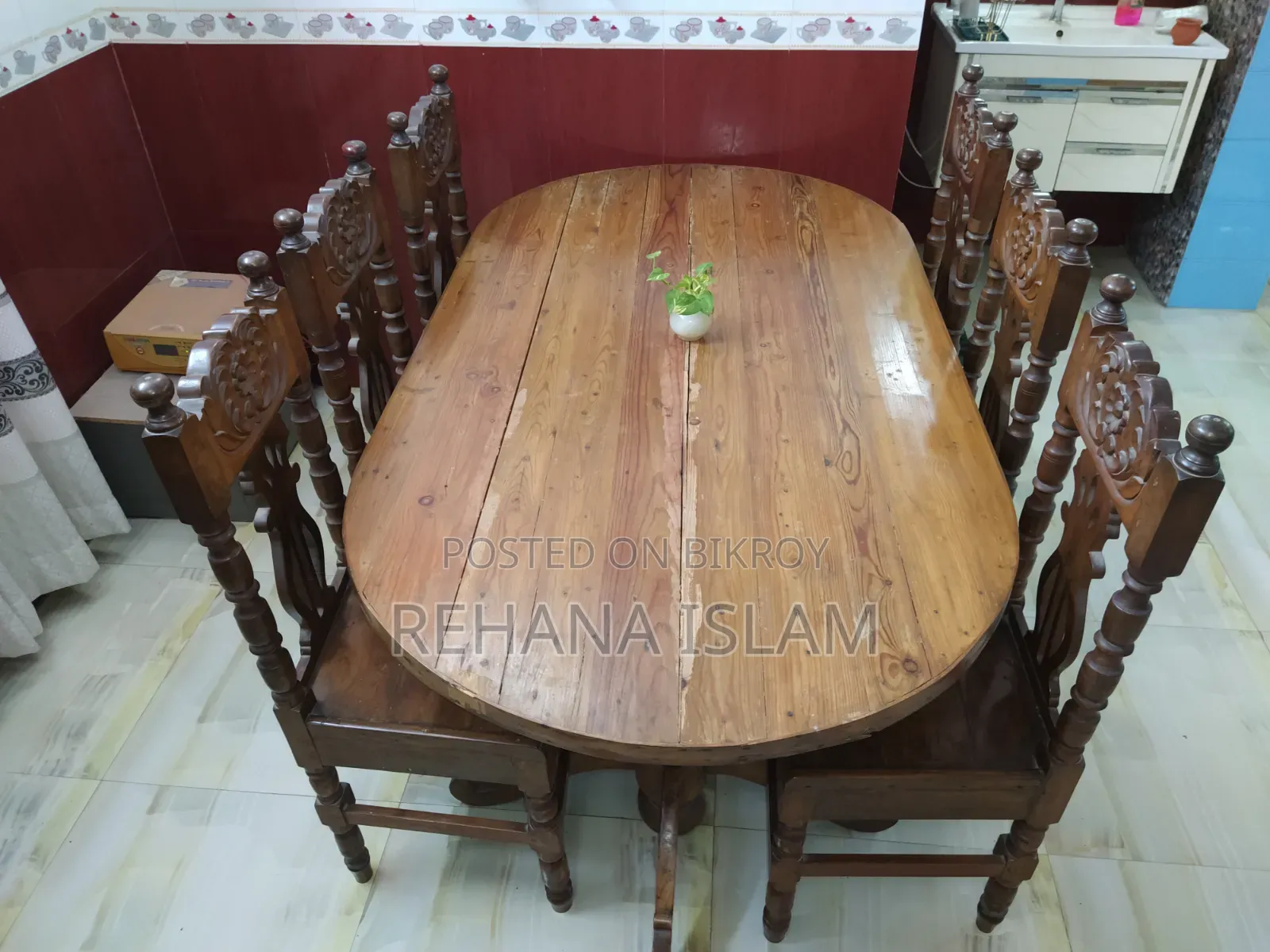 6-seater Teak Wood Dining Table. Comes with a free table cover set.