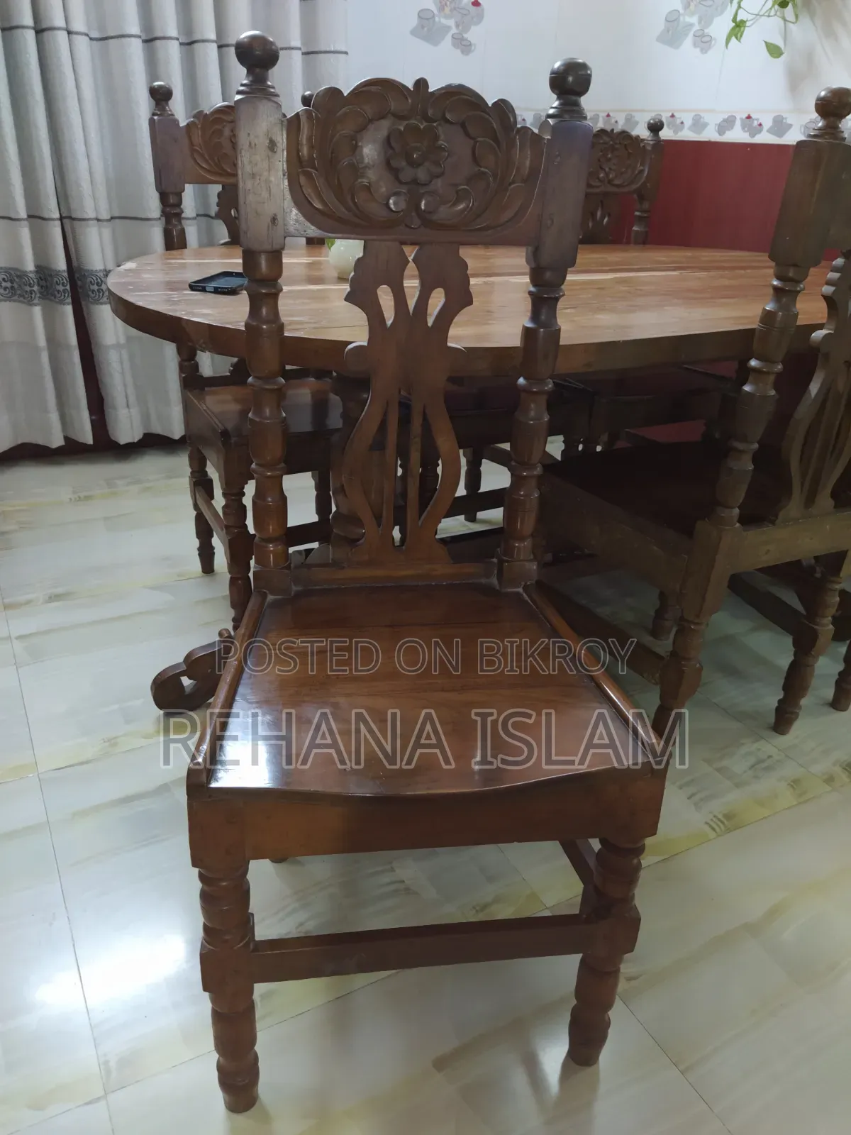 6-seater Teak Wood Dining Table. Comes with a free table cover set.