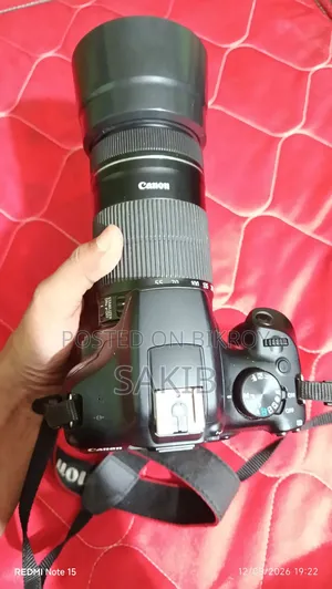Canon Eos 1300d DSLR Camera Body Paired With a Canon Ef-S55–250mm Zoom