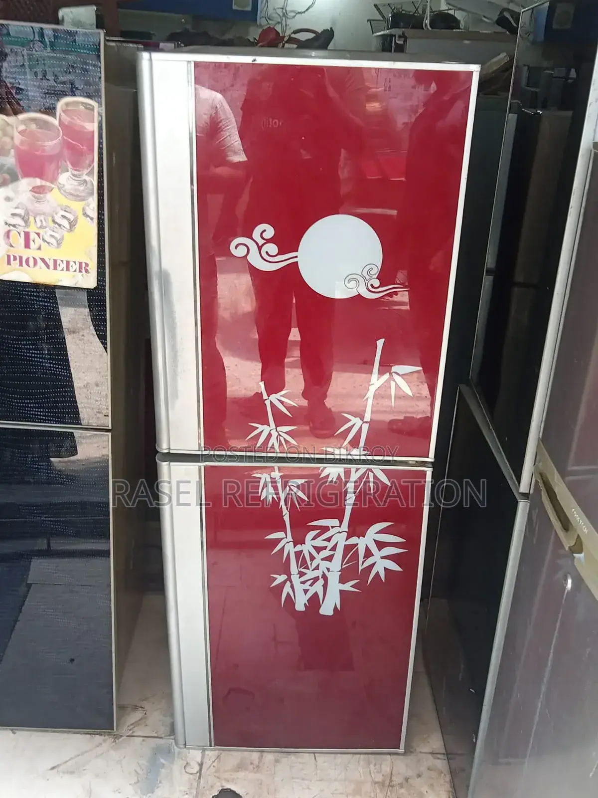 Red colored 14 CFT deep fridge for sale.