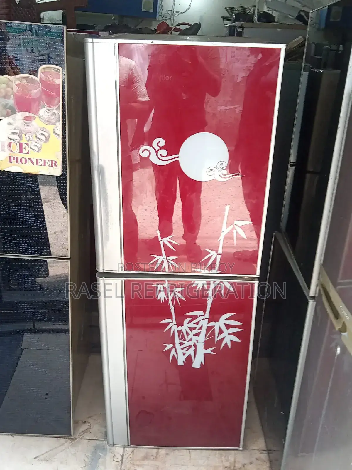 Red colored 14 CFT deep fridge for sale.