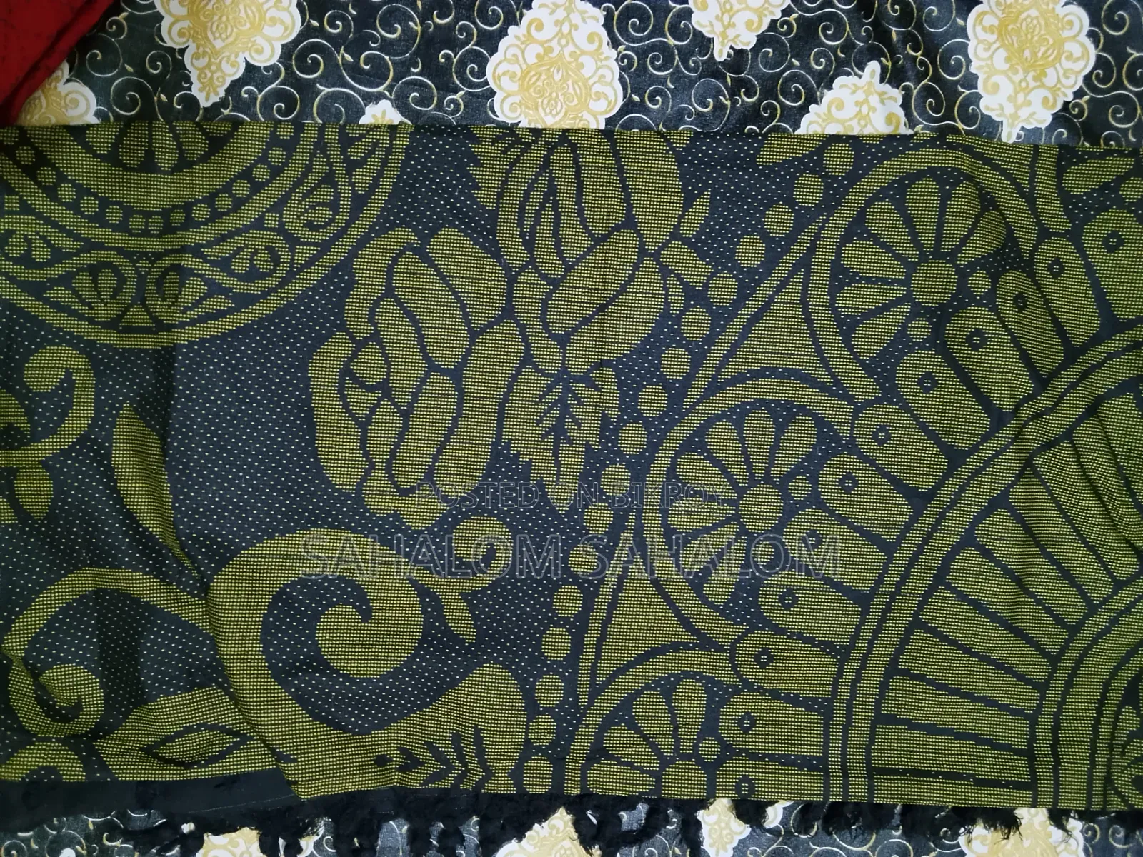 নিজ হাতে সেলাই করা বিছানার চাদর।