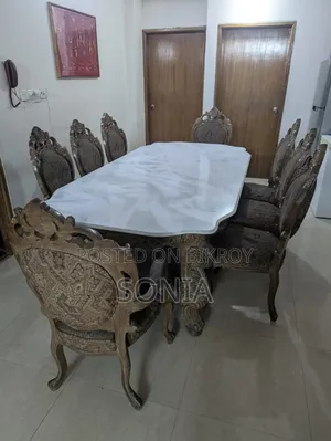 8 Seater Dining Table and Chairs