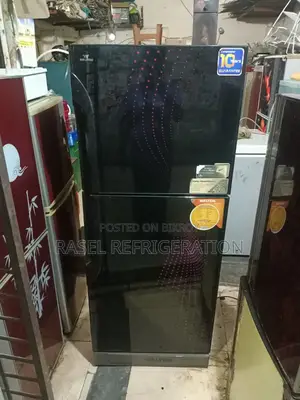 337 Liter running Walton company fridge for sale.