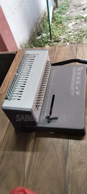 Manual Plastic Comb Binding Machine With Other Things. Urgent Sell.