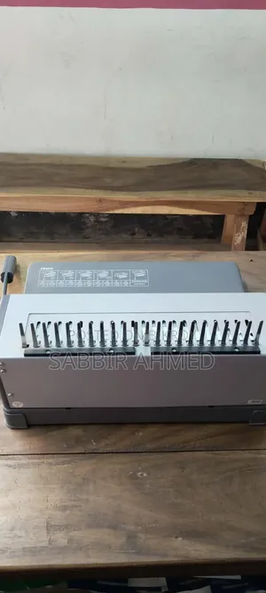 Manual Plastic Comb Binding Machine With Other Things. Urgent Sell.