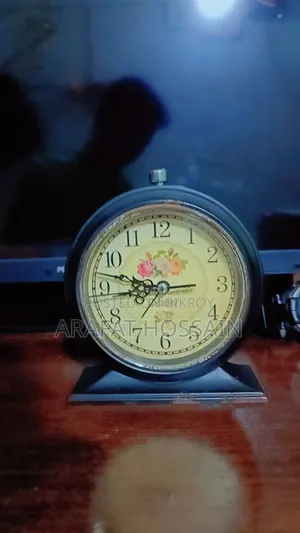 Stylish Table Clock. Beautiful vintage design table clock. Alarm and