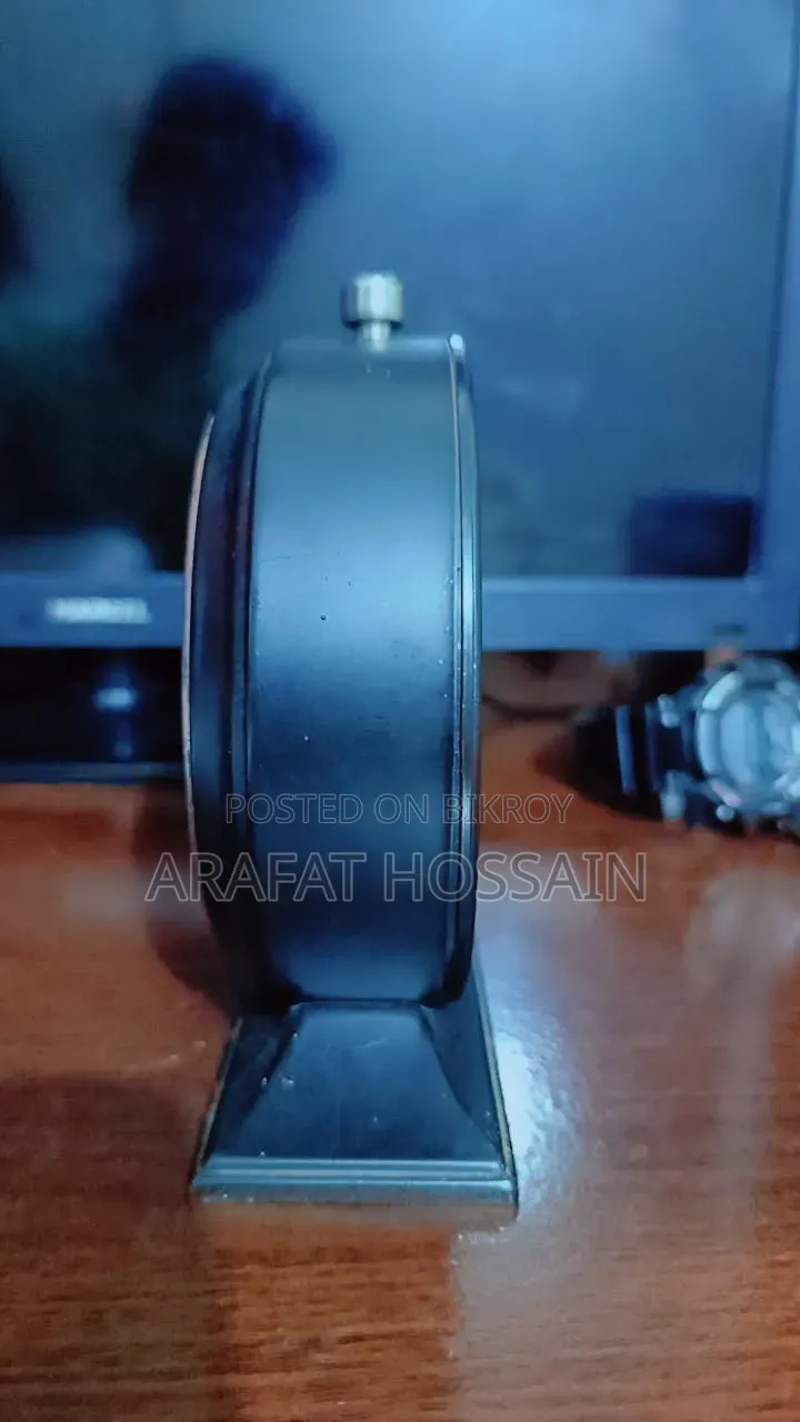 Stylish Table Clock. Beautiful vintage design table clock. Alarm and