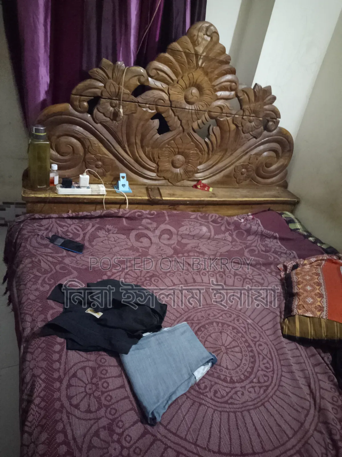 Carved Seven-Foot Wooden Bed