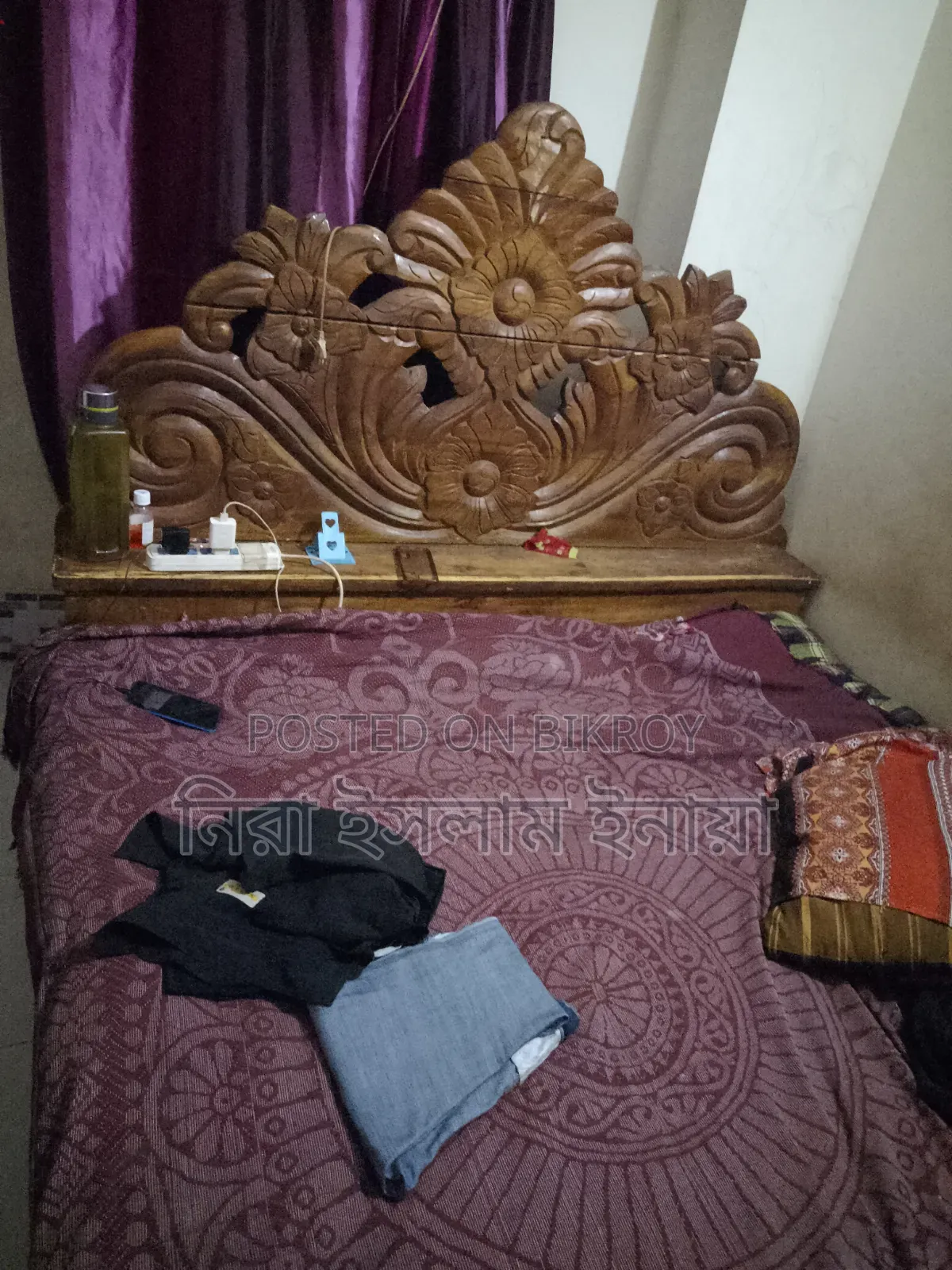 Carved Seven-Foot Wooden Bed