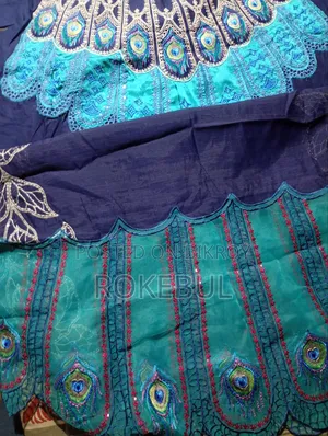 Pakistani Unstitched Three-Piece. Available at Wholesale Price.