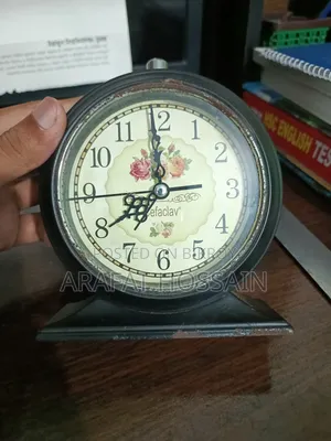 Stylish Table Clock. Beautiful vintage design table clock. Alarm and