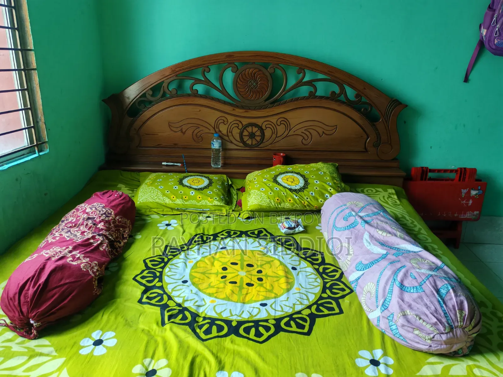 Selling a Malaysian wood bed.
