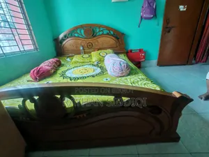 Selling a Malaysian wood bed.