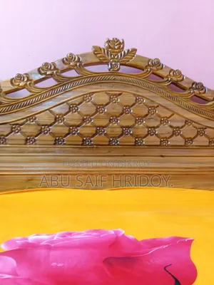 Akash Moni wood bed for sale.