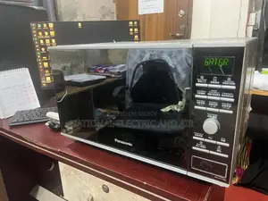Panasonic Nn-Cf770m Convection Flatbed Microwave Oven