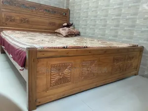 Full Akashmoni wood bed, 2 inches wide, 6ft/7ft. Selling with mattress.